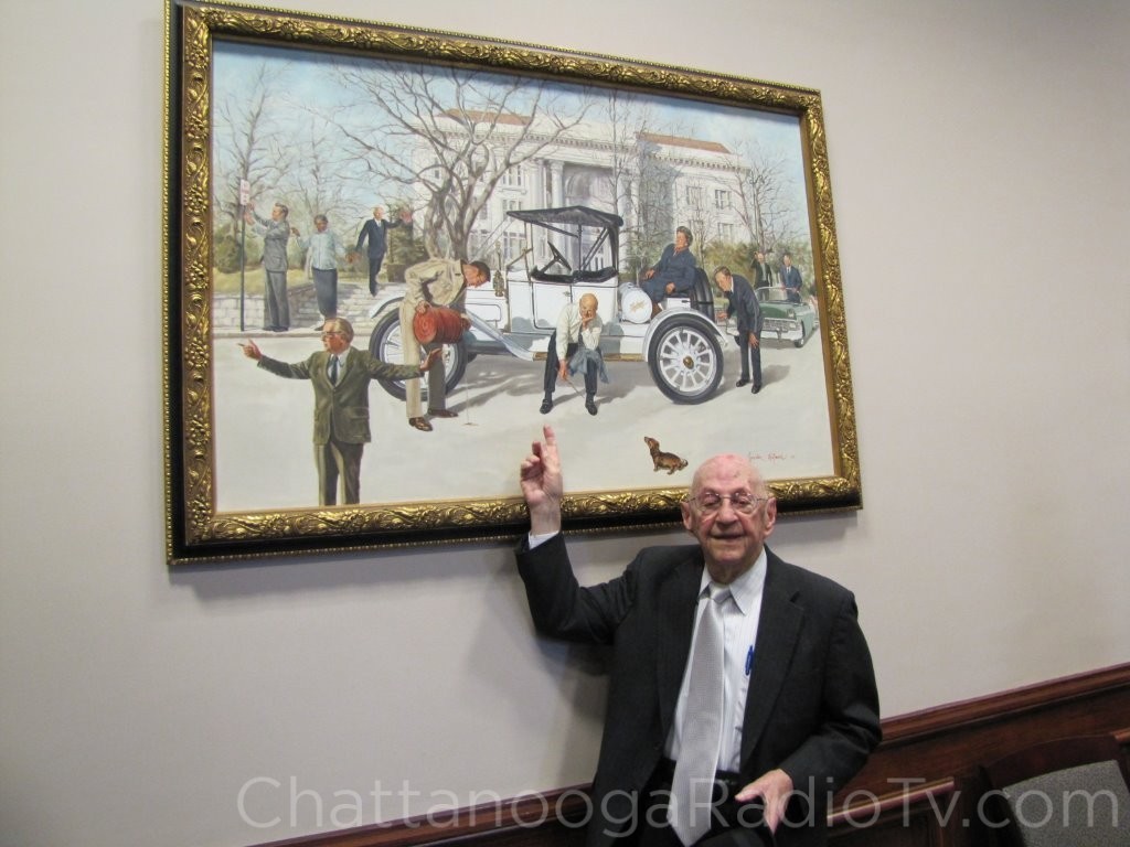 Luther in 2013, pointing himself out in the Gordon Wetmore painting in the Hamilton County Commission meeting room.