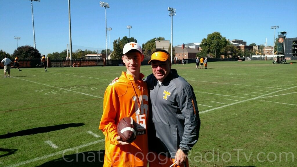 Logan Pickett with Coach Butch Jones